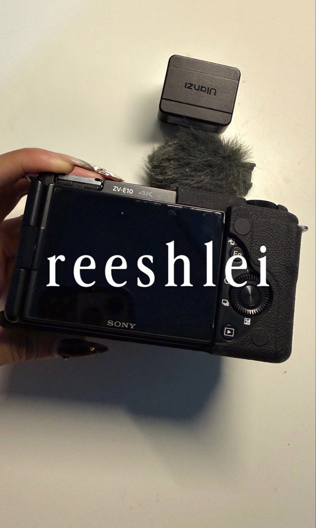 Sony ZV-E10 Mirrorless Camera with Accessories (Category: Cameras) located in Baguio. Submitted by reeshlei (Listing ID 1461022092, Image 3). Description: - Sony ZV-E10 camera - Includes furry windscreen and sakura hot shoe cover - Comes with 1 external flash - Includes bag, camera strap, and silicone case - Original box and receipt included - SD CARD NOT INCLUDED!!! female owned rfs: upgraded and rarely used.