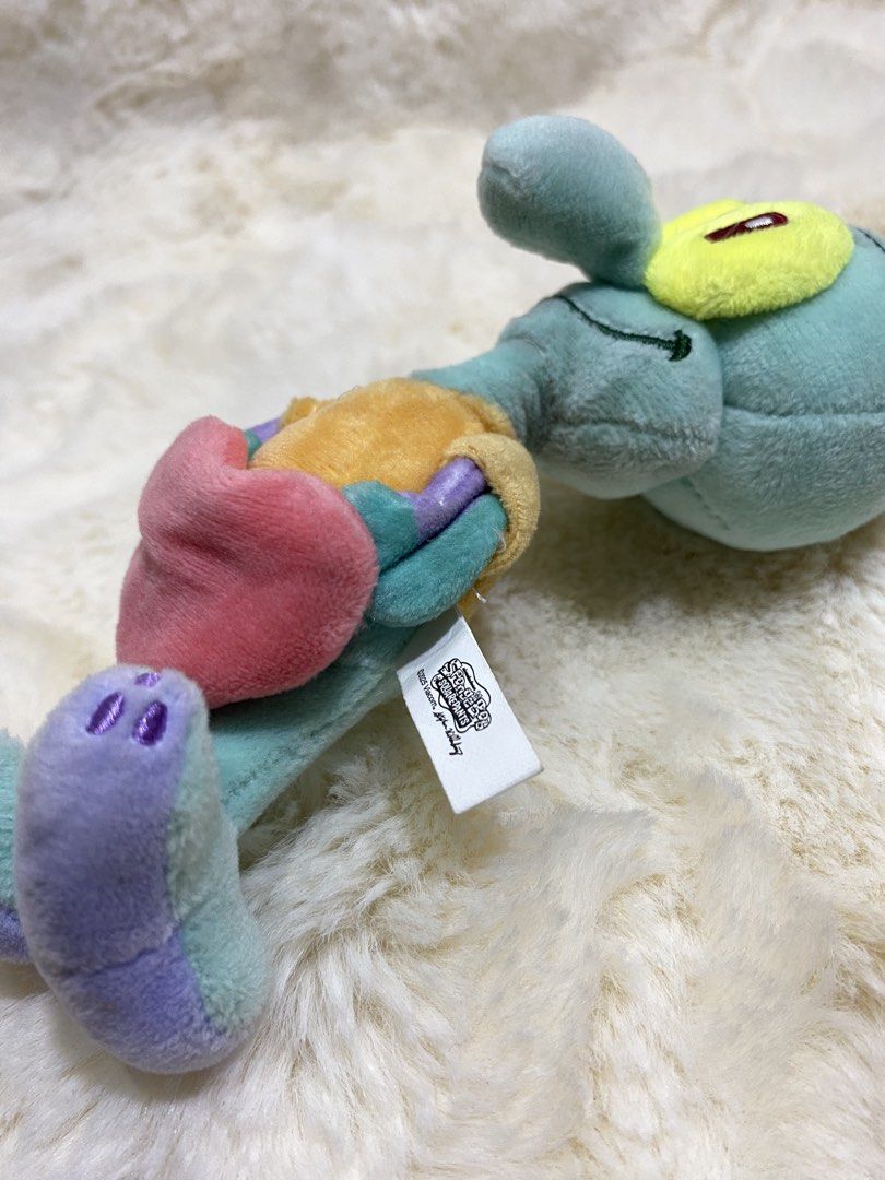 Squidward Plush Charm Keychain (Category: Plushies & Soft Toys) located in Kalibo. Submitted by ollie_stuffshop (Listing ID 1463038970, Image 3). Description: Before you send your inquiries: ❗️Last Price is already posted ❗️Manage your expectations, WYSIWYG ❗️May need washing ❗️Dropoff is every Wednesday & Sunday - Adorable Squidward plush toy - Features a cute pink heart - Includes a convenient keychain attachment - Ideal for any SpongeBob Squar