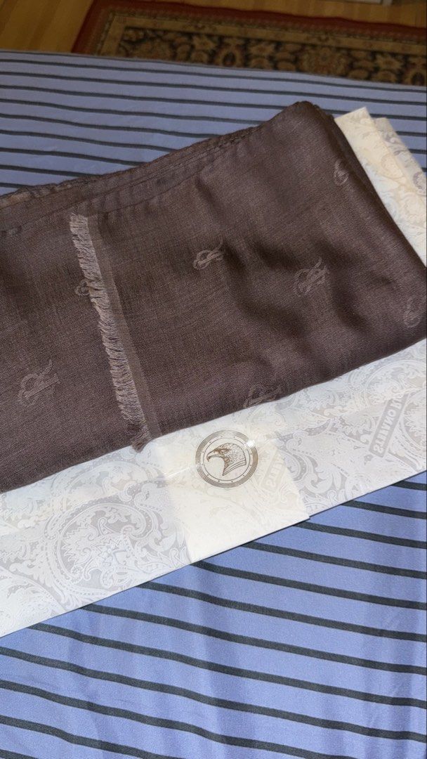 Stefano Ricci Silk Scarf Italy (Category: Scarves) located in Quezon City. Submitted by nyc1900 (Listing ID 1463043643, Image 1). Description: Brand New Brown Stefano Ricci monogram jacquard scarf with frayed edges. Comes with box and wrapping paper. Retails for around $550 or ~₱35,000. Can be for gifting Material: Silk Dimensions: 28” in x 80” NEGOTIABLE 🙌🏽.