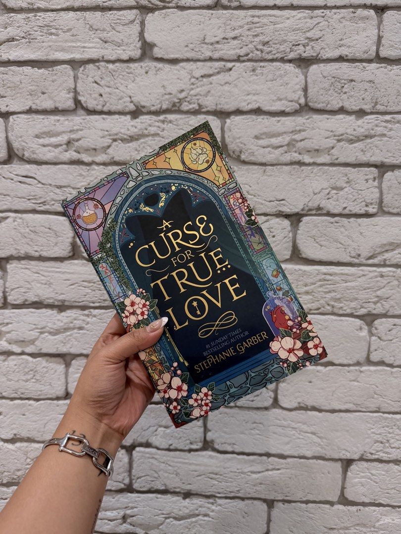 Stephanie Garber - A Curse for True Love (Category: Storybooks) located in Manila. Submitted by mbsbabies2021 (Listing ID 1463062960, Image 1). Description: A Curse for True Love - UK edition from Hodder & Stoughton (Paperback) Brand New, never used (haven’t cracked the spine, etc.) RFS: Wanted the pink edition, got the pink edition hehe Can do meetups around BGC, otherwise shipping is covered by buyer.