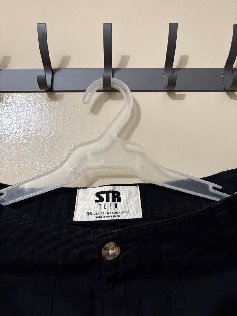 STR Black Cargo Pants (Category: Jeans) located in Manila. Submitted by outtacloset (Listing ID 1463009485, Image 2). Description: - STR TEEN Black Cargo Pants - Size: 36 - Multiple pockets on legs - Button and zip closure - Made in Bangladesh - Ideal for casual wear.