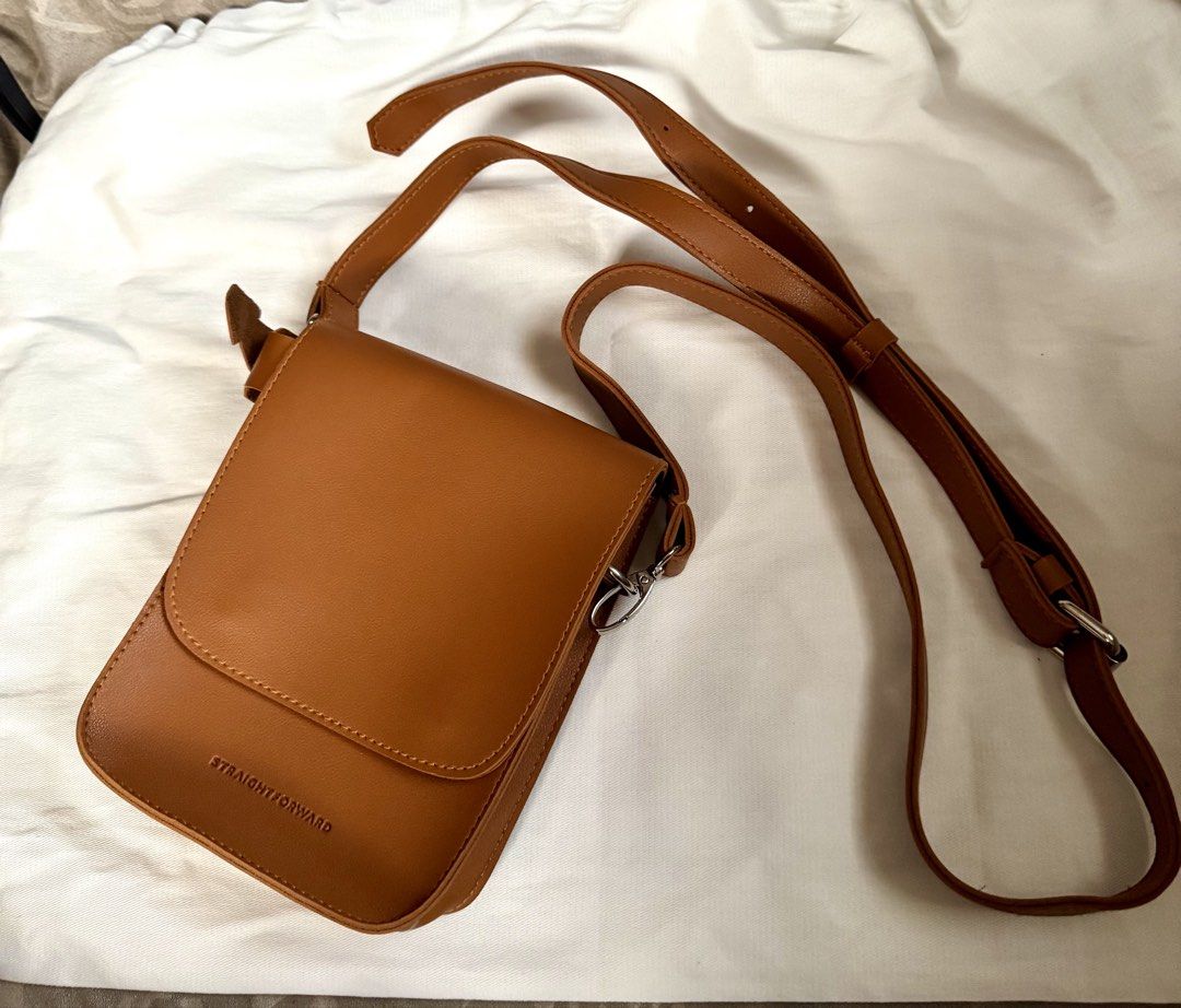 Straightforward Brown Leather Crossbody Bag (Category: Cross-body Bags) located in San Fernando. Submitted by shopsarang17714 (Listing ID 1462941100, Image 1). Description: - Brand: Straightforward - Used once.