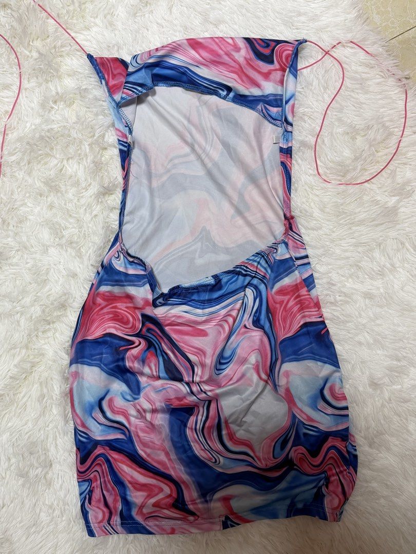 Strapless Marble Print Bodycon Mini Dress (Category: Dresses) located in Manila. Submitted by warmeagle_a4ba85 (Listing ID 1462990417, Image 2). Description: - Super cute strapless mini dress - Vibrant pink, blue, and white marble swirl pattern - Tie-up halter neck - Open back design - Stretchy material for a comfortable fit - Ideal for nights out or parties.