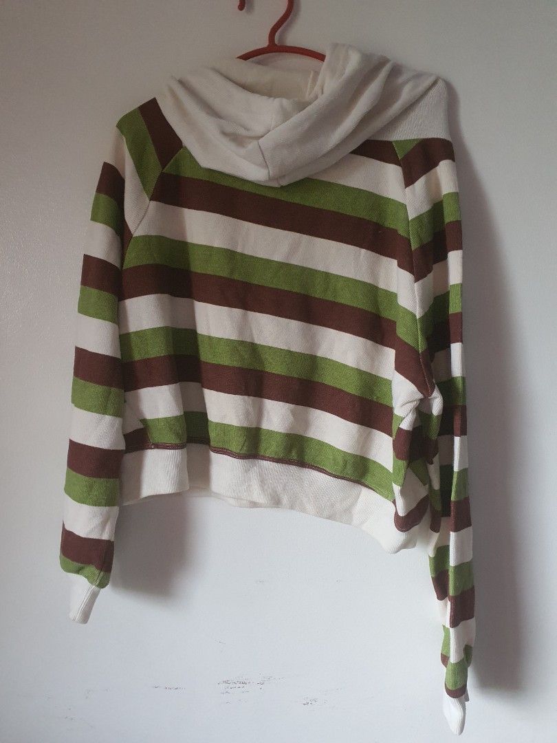 Striped Hoodie with Drawstring Hood (Category: Hoodies) located in Meycauayan. Submitted by shoptoown (Listing ID 1462899902, Image 2). Description: - Casual striped hoodie - Drawstring hood and long sleeves - Stylish brown and green stripe pattern - Comfortable for everyday wear - Approx. Measurements: Chest - 17 inches, Length - 16 inches.