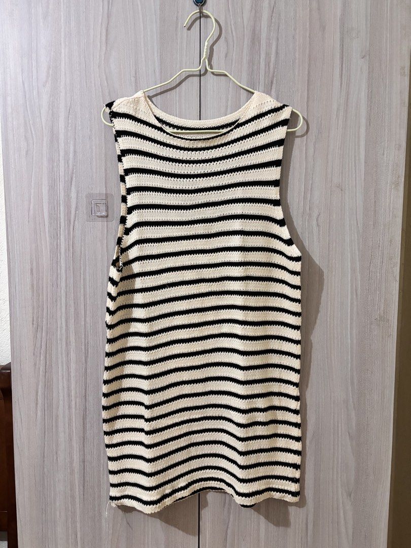 Striped Sleeveless Knit Top (Category: Sleeveless) located in Leyte. Submitted by modernpersephone (Listing ID 1463034630, Image 1). Description: - Cream and black striped sleeveless knit top - Comfortable crew neck design - Versatile for layering or wearing solo - Effortlessly pairs with jeans or shorts Best fit for S-M Condition: 7/10.