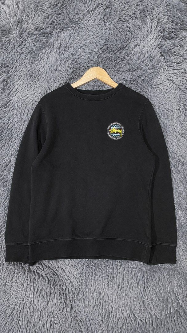 Stussy Black Crewneck Sweatshirt (Category: Coats, Jackets and Outerwear) located in Davao. Submitted by erwin_james (Listing ID 1463009755, Image 1). Description: - Black Stussy crewneck sweatshirt - Size: Small - Features circular graphic on front - Large graphic with Stussy branding and abstract patterns on back - Material: Cotton blend - Ideal for casual wear -DIMENSION:21x27.