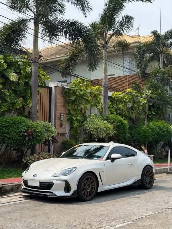 Subaru BRZ Eyesight Auto (Category: Used Cars) located in Manila. Submitted by jeremycarlgarcia_official (Listing ID 1462997660, Image 2). Description: Cash / Trade / Financing Subaru BRZ Eyesight 2023 model Automatic Transmission 10k mileage only Loaded loaded 👇🏻👇🏻 Rays 57XT Bronze Rays Center Cap Rays Lugnuts Champiro SX2 Tires STI Chin STI Side Skirt STI Rear Skirt STI Carbon Ducktail 2 Keys First owner acquired Brandnew Condition Casa Mai