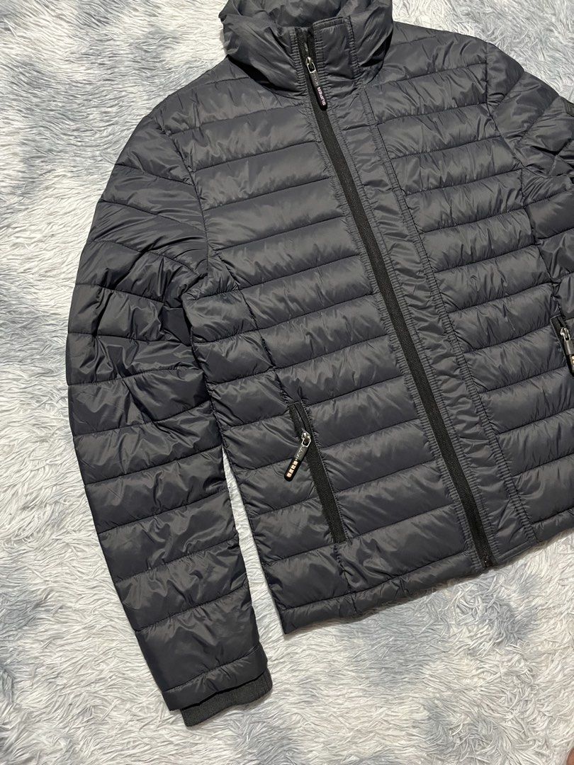 Superdry Triple Zip Puffer Jacket (Category: Coats, Jackets and Outerwear) located in Sasmuan (Sexmoan). Submitted by winterclothes.ph (Listing ID 1462891766, Image 3). Description: Superdry Triple Zip Puffer Jacket L on tag Width 22.5 Length 27 Excellent Condition .
