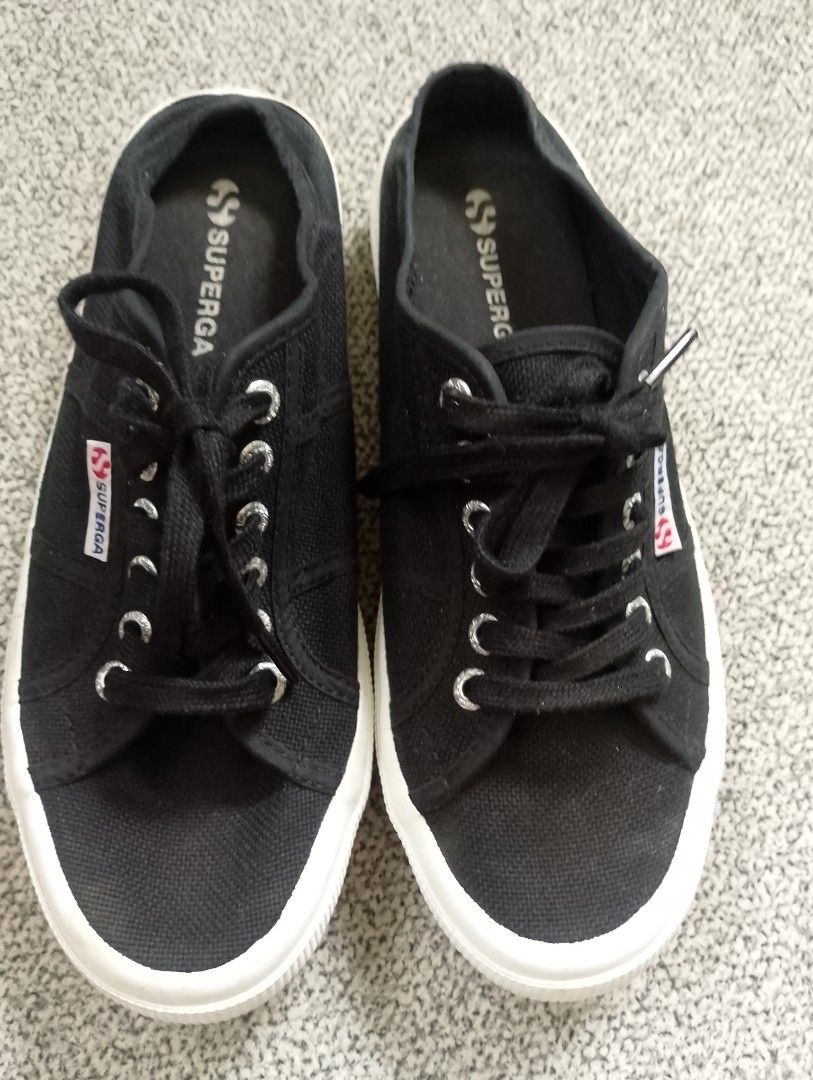 Superga 2402 Mule Black/White (Category: Sneakers) located in Cabadbaran. Submitted by ztsfinds (Listing ID 1462941404, Image 3). Description: Superga 2402 MULE Sneakers (Black/White) – Size EU 39 Condition Highlights: Uppers: Deep black canvas in great condition with no major fading or tearing. Hardware: All silver-tone branded eyelets are intact and firmly secured. Heels & Branding: Rear "Superga" heel patches are crisp, clear, and perfectly re