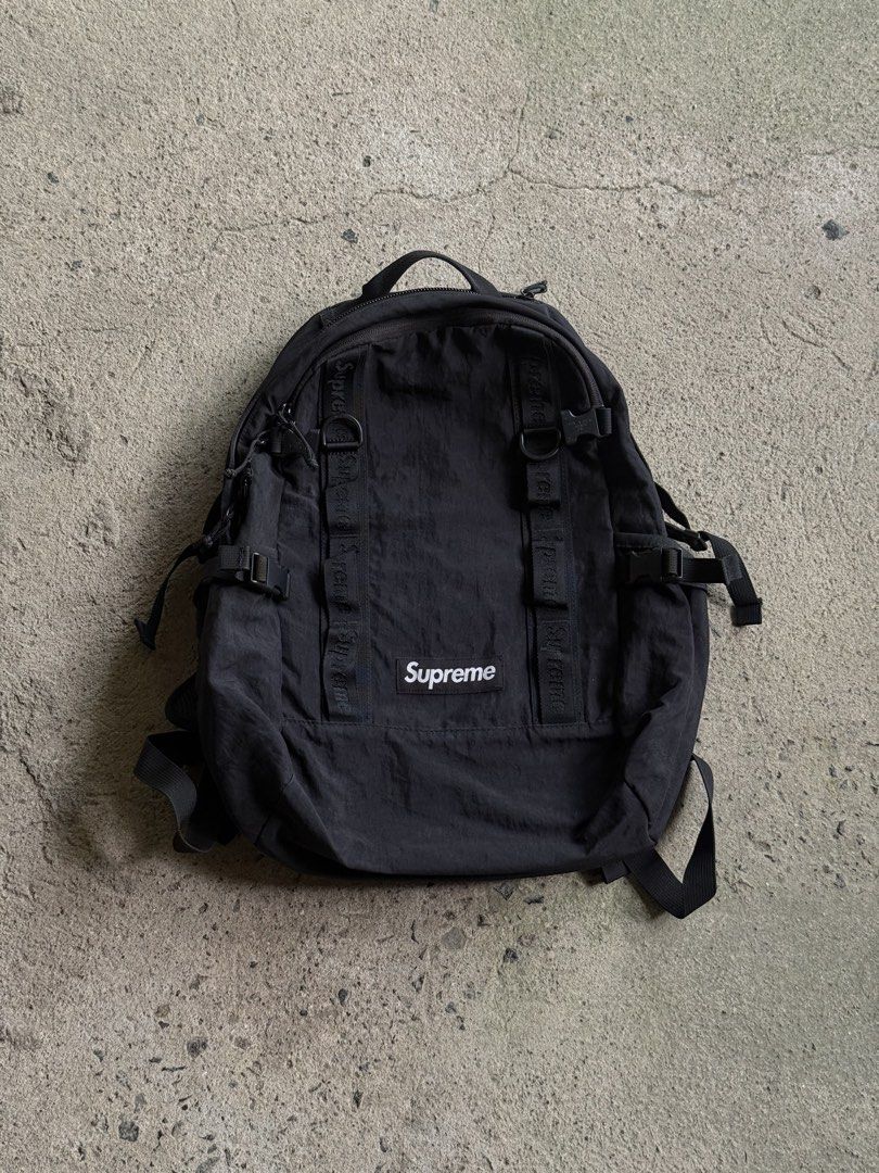 Supreme Black Backpack (Category: Backpacks) located in Manila. Submitted by yamborghini22 (Listing ID 1462986919, Image 1). Description: - Authentic Supreme backpack - Made in Vietnam - Multiple straps and buckles for secure storage - Wide-opening main compartment for easy access - Internal zip pocket for small essentials - Padded back panel for comfortable carrying - Ideal for everyday use.