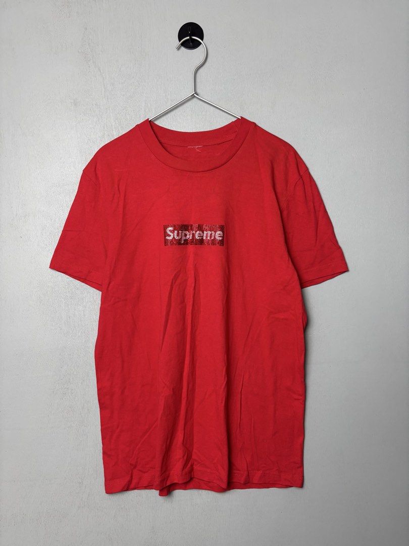 Supreme -Swarovski Box Logo Shirt (Category: Tshirts & Polo Shirts ) located in Mandaluyong City. Submitted by fellas_ph (Listing ID 1463042753, Image 1). Description: Excellent condition Cut necktag, missing 1 stone Size M 19.5" Width 27" Length.