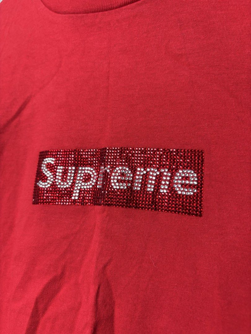 Supreme -Swarovski Box Logo Shirt (Category: Tshirts & Polo Shirts ) located in Mandaluyong City. Submitted by fellas_ph (Listing ID 1463042753, Image 2). Description: Excellent condition Cut necktag, missing 1 stone Size M 19.5" Width 27" Length.