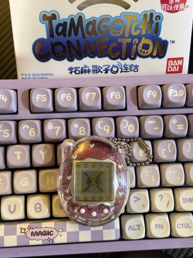 Tamagotchi Connection (Category: Interactive Toys) located in Cabuyao City. Submitted by nethcantalejo8888 (Listing ID 1463109676, Image 1). Description: 💗Tamagotchi Connection V3 rerelease -installed screen protector since Day 1 -clear case included -sf will be shouldered by the buyer -Shipping via J&T .