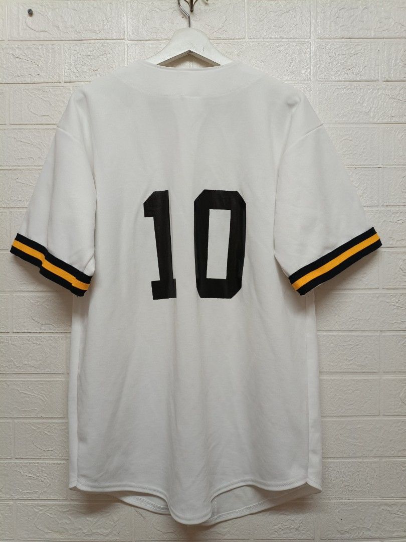 Teamwork Athletic Apparel Pirates Baseball Jersey Size L (Category: Tshirts & Polo Shirts ) located in Quezon City. Submitted by rod_raymundo (Listing ID 1462896342, Image 2). Description: - White baseball jersey with 'PIRATES' across the chest. - Number '10' prominently displayed on the back. - Sleeves feature stylish black and yellow stripes. - Made by reputable brand Teamwork Athletic Apparel. - Size L (fits chest sizes 42-44). - Ideal for spo