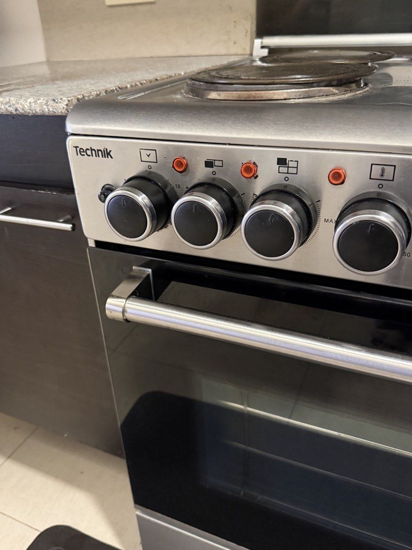Technik Cooking Range Electric Oven (Category: Bakeware) located in Marikina City. Submitted by cluttermatters (Listing ID 1462984270, Image 2). Description: Bought for P25,000 Product Description: 60 cm Cooking Range 4 Electric Hot Plates Minute Minder Full Stainless Steel Oven Features: Electric Multifunction Oven 4 Cooking Functions Thermostat Controlled Oven Double Glass LOW-E Oven Door 80 L - Large Oven Rotisserie Dimension (h:w:d) 81:60:60 