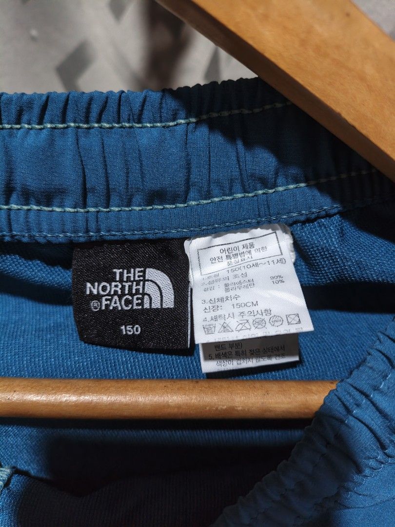 The North Face Blue Shorts Size 150 (Category: Shorts) located in Maasim. Submitted by ukayganda25 (Listing ID 1463049199, Image 3). Description: - Brand: The North Face - Color: Blue - Size: 150 (Kids') - Features: Elastic waistband with drawstring - Material: Polyester and Polyurethane (check tags for specifics) - Ideal for: Sports, casual wear, kids -26-28 waistline small adult can fit.