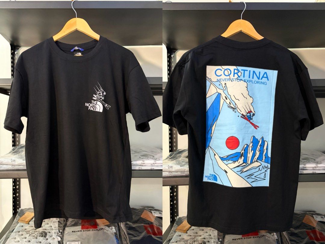 The North Face Graphic T-Shirts (Multiple Designs) (Category: Tshirts & Polo Shirts ) located in Cavite. Submitted by clarisseannr (Listing ID 1463085981, Image 3). Description: - The North Face Graphic Tees - Available Designs: 'Out of Office', 'Adventure', 'Cortina', 'Heaven & Earth' - Colors: Black and White - Material: Comfortable Cotton - Perfect for outdoor enthusiasts, casual wear, or layering - Great prints for any adventure!.