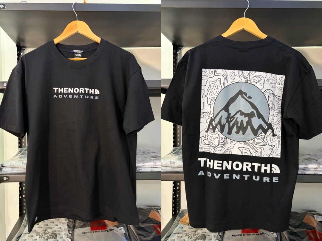 The North Face Graphic T-Shirts (Multiple Designs) (Category: Tshirts & Polo Shirts ) located in Cavite. Submitted by clarisseannr (Listing ID 1463085981, Image 2). Description: - The North Face Graphic Tees - Available Designs: 'Out of Office', 'Adventure', 'Cortina', 'Heaven & Earth' - Colors: Black and White - Material: Comfortable Cotton - Perfect for outdoor enthusiasts, casual wear, or layering - Great prints for any adventure!.