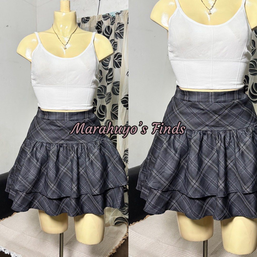 Tiered Ruffle Plaid Mini Skirt with Inner Short (Category: Skirts) located in Mabalacat. Submitted by marahuyos.finds (Listing ID 1462931325, Image 2). Description: - Adorable tiered ruffle skirt with a classic plaid pattern. - Includes an inner short for added comfort and coverage. - Elasticized waist fits 24-27 inches. - Size XS-M. - Versatile for casual outings or dressing up..