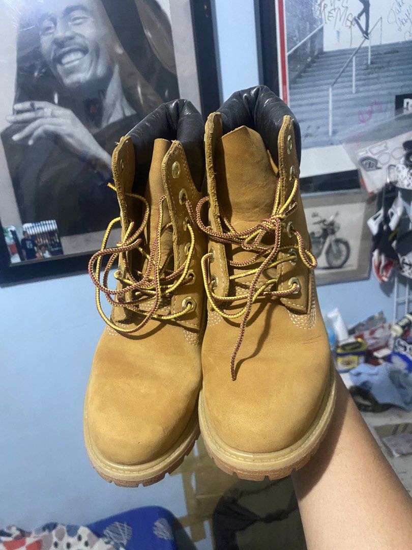 Timberland Classic 6-Inch Premium Waterproof Boots (Category: Sneakers) located in Davao. Submitted by BALONG187 (Listing ID 1462898660, Image 2). Description: - Classic tan Timberland boots - Waterproof nubuck leather - Lace-up front with yellow and red laces - Padded collar for comfort - Durable rubber lug outsole for traction - Iconic Timberland style.