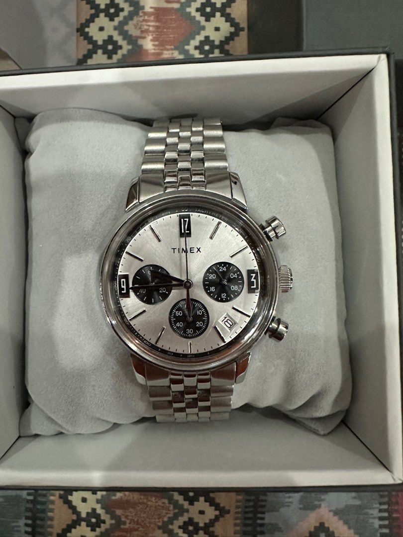 Timex Chronograph Watch Silver Stainless Steel (Category: Men's Watches) located in Mandaue City. Submitted by alexdelmar22310 (Listing ID 1463040135, Image 1). Description: - Timex Chronograph Watch - Features a sleek silver dial - Durable stainless steel band - Comes with original box and packaging - Extra links are inside the box - Versatile for everyday wear or special events - Reason for selling: Rarely worn & Decluttering - Price is Negotia