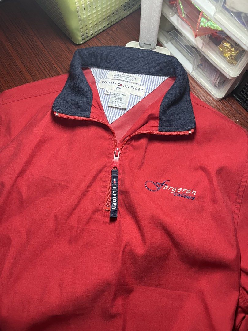 Tommy Hilfiger Golf windbreaker jacket / pullover (Category: Coats, Jackets and Outerwear) located in Manila. Submitted by heyzel.finds (Listing ID 1463019946, Image 2). Description: Tommy Hilfiger Golf • Brand: Tommy Hilfiger Golf • Size: Medium – Semi Large • Width: 22” • Length: 25” • Color: 10/10 • Condition: Pre-loved / Good condition • Classic golf-inspired style, perfect for casual or sporty fits Measurements: Width: 22” Length: 25”.