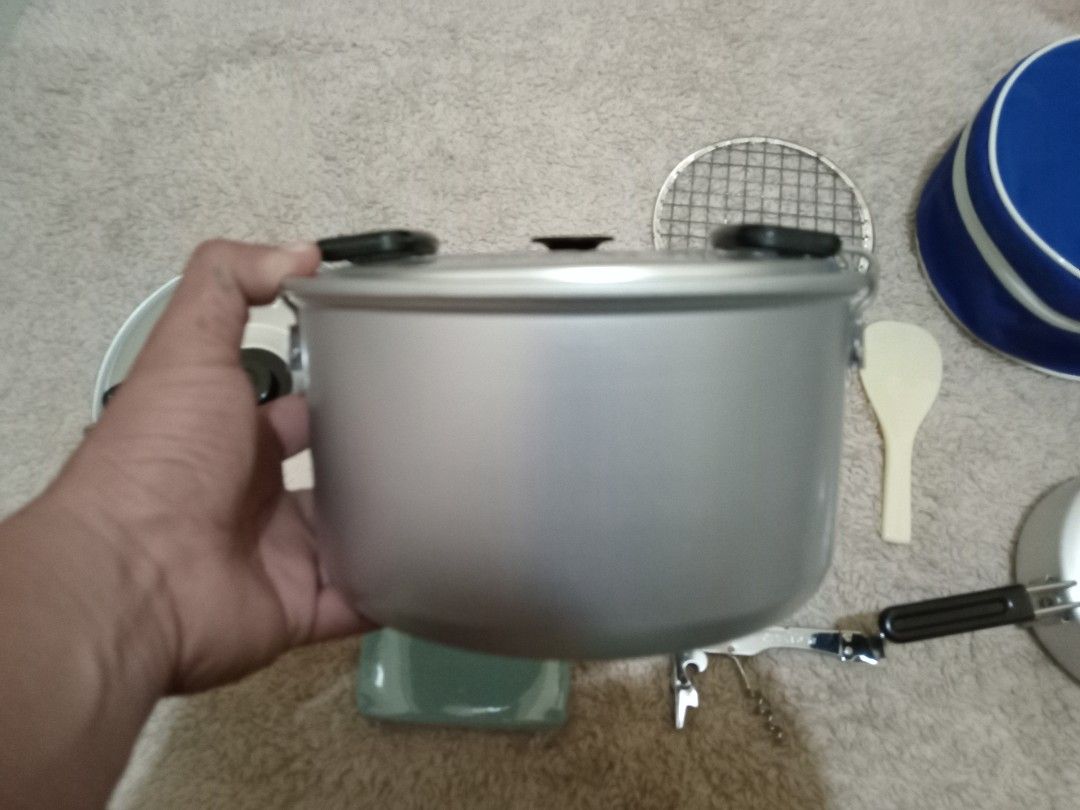 TOP by Kocher Camping Cookware Set with Bag (Category: Hiking & Camping) located in Tagum. Submitted by jasraggamuffin (Listing ID 1463038435, Image 3). Description: - New Top RV Kocher camping cookware set - Includes: pots, kettle, ladle, rice spoon, grill rack, - Comes with a blue storage bag - Ideal for outdoor adventures - 3-4 persons - All pieces made of durable aluminum.