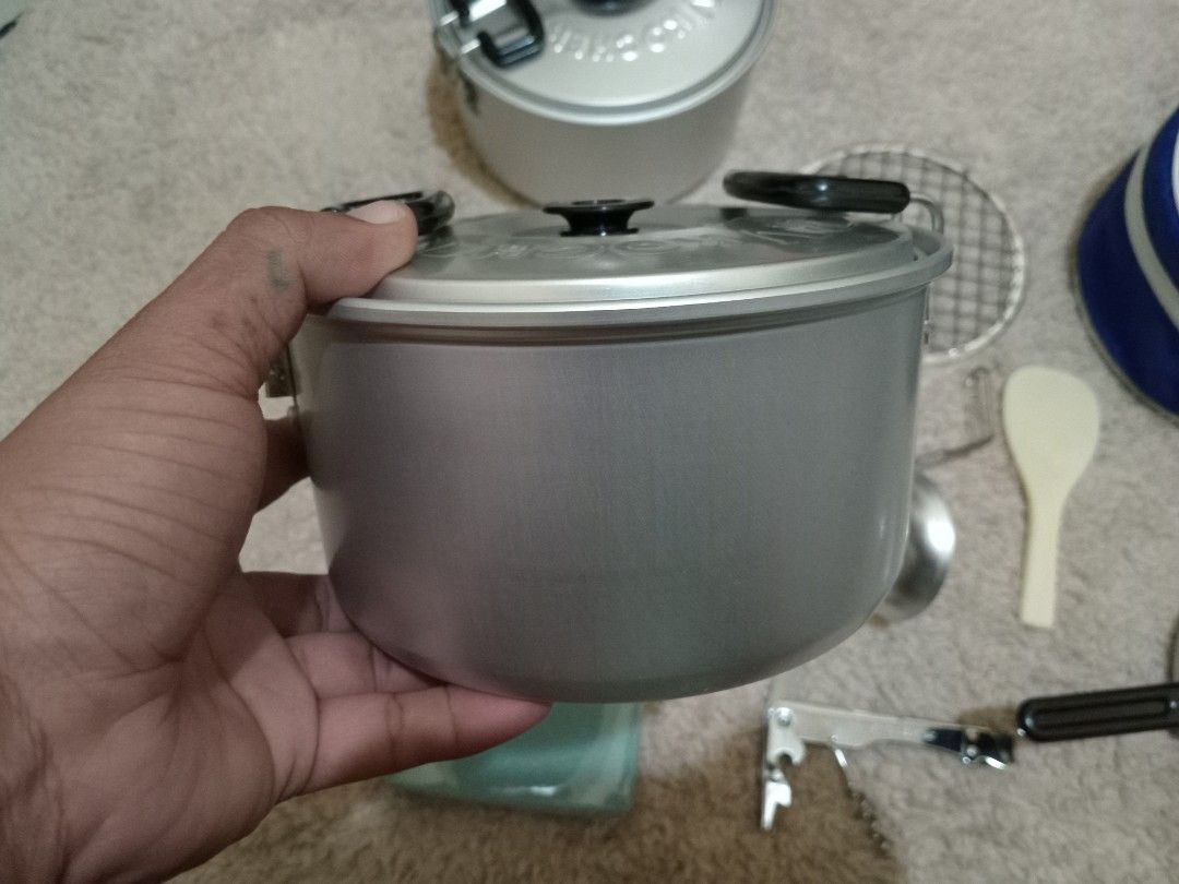 TOP by Kocher Camping Cookware Set with Bag (Category: Hiking & Camping) located in Tagum. Submitted by jasraggamuffin (Listing ID 1463038435, Image 2). Description: - New Top RV Kocher camping cookware set - Includes: pots, kettle, ladle, rice spoon, grill rack, - Comes with a blue storage bag - Ideal for outdoor adventures - 3-4 persons - All pieces made of durable aluminum.