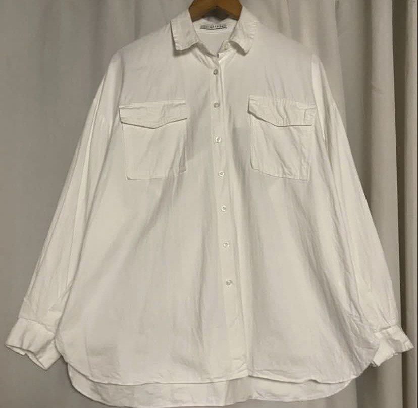 TOPDRESSING White Oversized Open Back Slit Front Pockets Longsleeve (Category: Shirts) located in Caloocan City. Submitted by declutteringph. (Listing ID 1463039655, Image 3). Description: No Size on the tag! Dimensions: (inches) Shoulder Width: 29” Bust width: 29” Body Length: 29” - 30.5” Sleeves Length: 20”.
