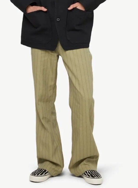 Tornado Mart Striped Pants Size L (Category: Jeans) located in Santa Rosa. Submitted by y2kstylist (Listing ID 1461216938, Image 1). Description: - Tornado Fair Pants - Size: L - Color: Light Brown - Pattern: Subtle Vertical Stripes - Closure: Zip Fly - Style: Casual Wear - Condition: Please check photos for details size 32.