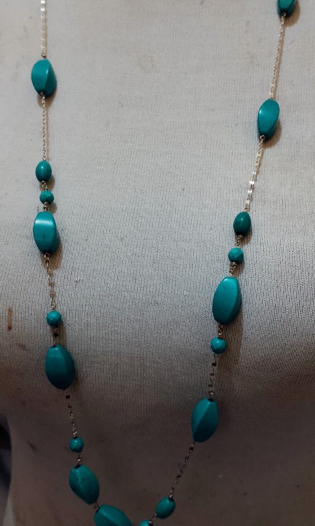 Torquise long chain branded necklace (Category: Necklaces) located in Manila. Submitted by julius_onlineshop14 (Listing ID 1463007877, Image 3). Description: J.R.R tolkien monogram brand related collection to lord of the ring 24"Japan source.