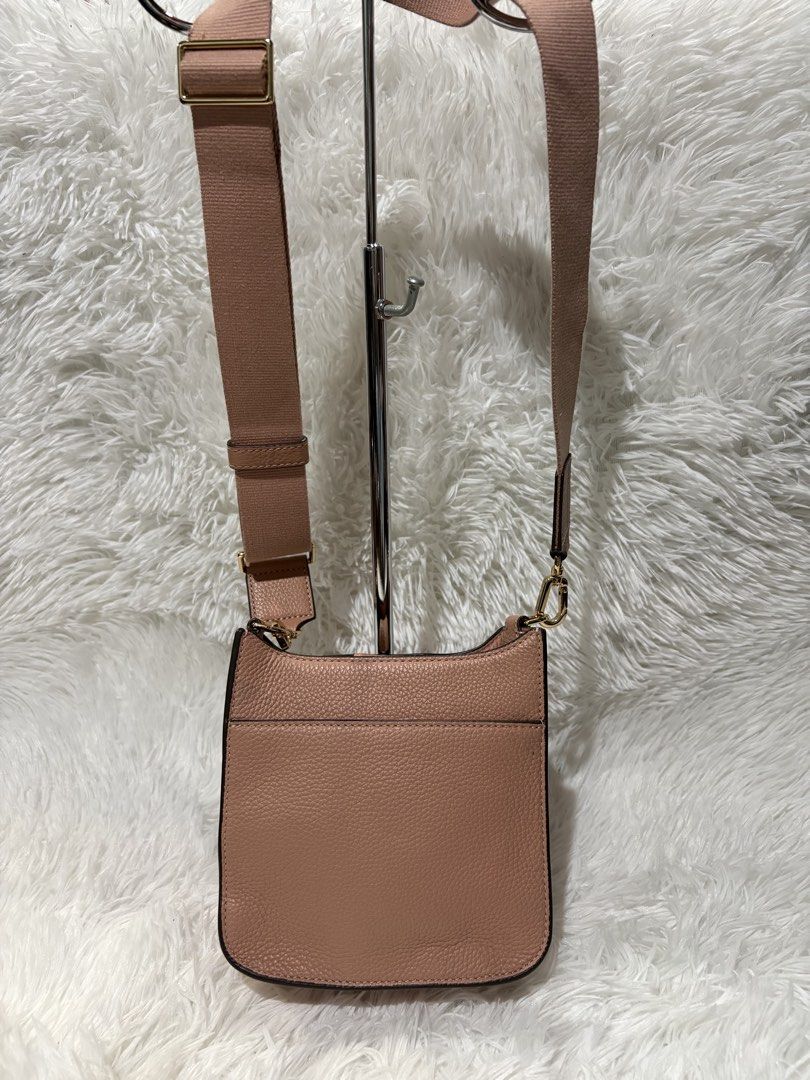 Tory burch (Category: Luxury Bags & Wallets) located in Baguio. Submitted by rheaanne07 (Listing ID 1462885708, Image 3). Description: Tory burch thea mini web shoulder bag in soft pink moon shade Missing tassle Pero pretty pa din Like new Orig.