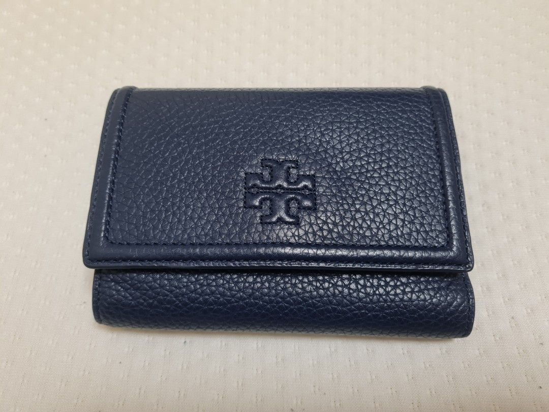 Tory Burch Wallet (Category: Wallets & Card holders) located in Dasmarinas. Submitted by ramyeong (Listing ID 1462916570, Image 1). Description: Tory Burch Wallet Bought in outlet (can't remember if in US or Japan) I will try to find a small TB paper bag May have a mild stored smell due to long-term storage.