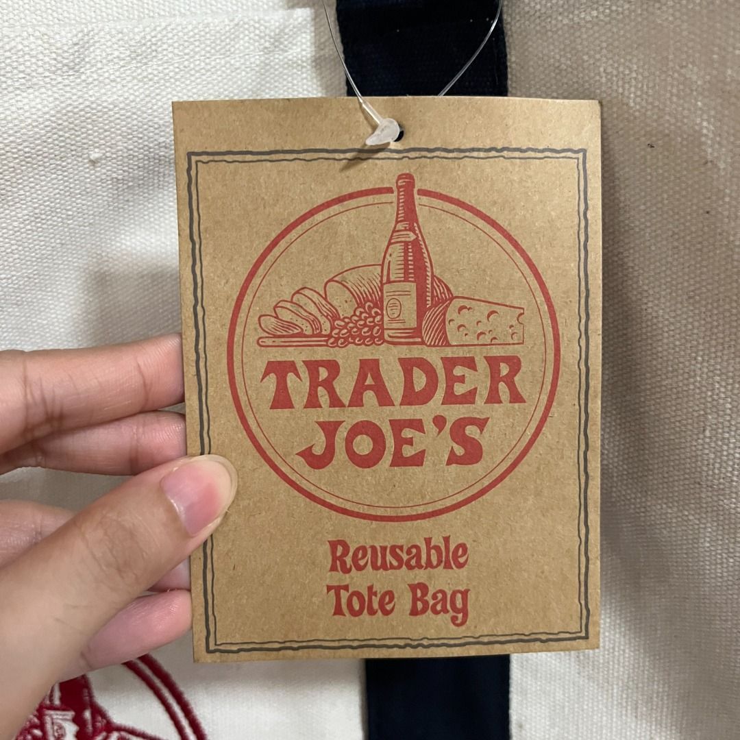 Trader Joe's Canvas Tote Bag (Large) (Category: Tote Bags) located in Santa Rosa. Submitted by blousa.ph (Listing ID 1463021729, Image 2). Description: Trader Joe's Canvas Tote Bag (Large) Color: Dark Blue Bought from Boston, USA 📍 Santa Rosa City, Laguna (On-Hand) 🛵 Ship via J&T, LBC, or Lalamove (SF shouldered by the buyer) 🏷️ Price is still negotiable :).