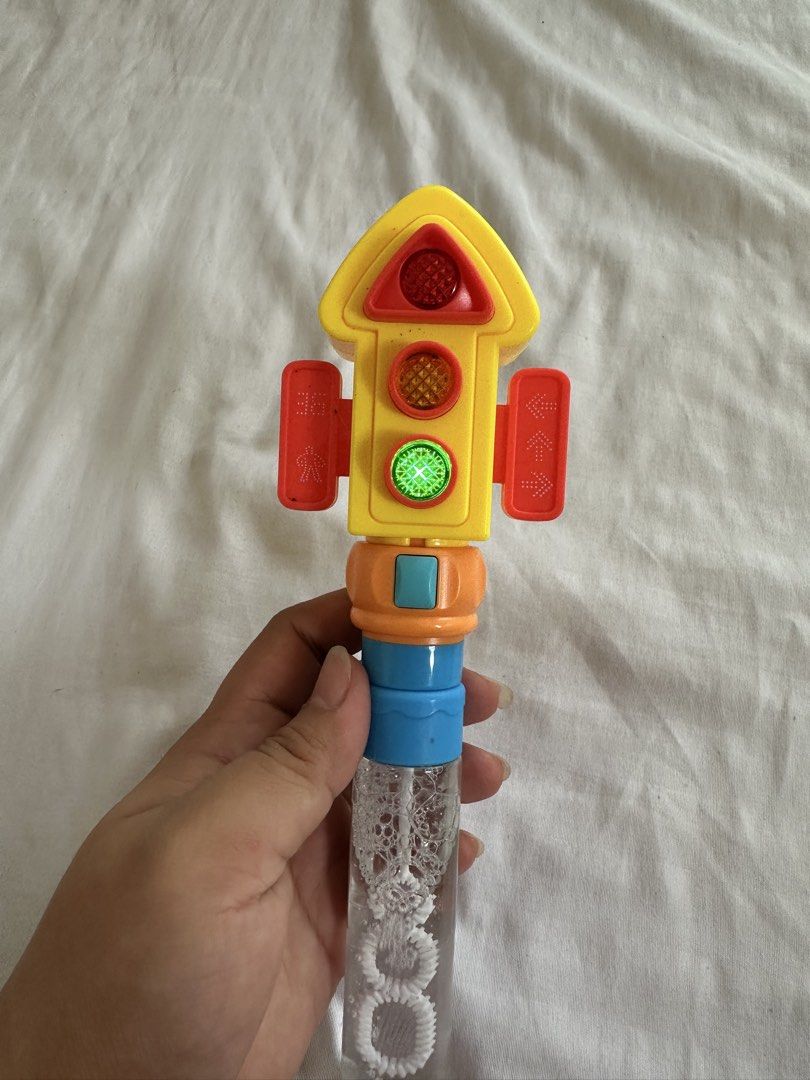 Traffic Light Bubble Wand Toy with Lights (Category: Kids Toys) located in Manila. Submitted by michaellal91842 (Listing ID 1462966703, Image 1). Description: - Fun traffic light design bubble wand - Lights up with a button press - Bubble solution included, ready to use - Easy to play, just blow! - Ideal for outdoor activities and parties - A hit with kids! Perfect for lootbag filler With lights Mall quality/ bought sale sa mall 80 nalang Popping