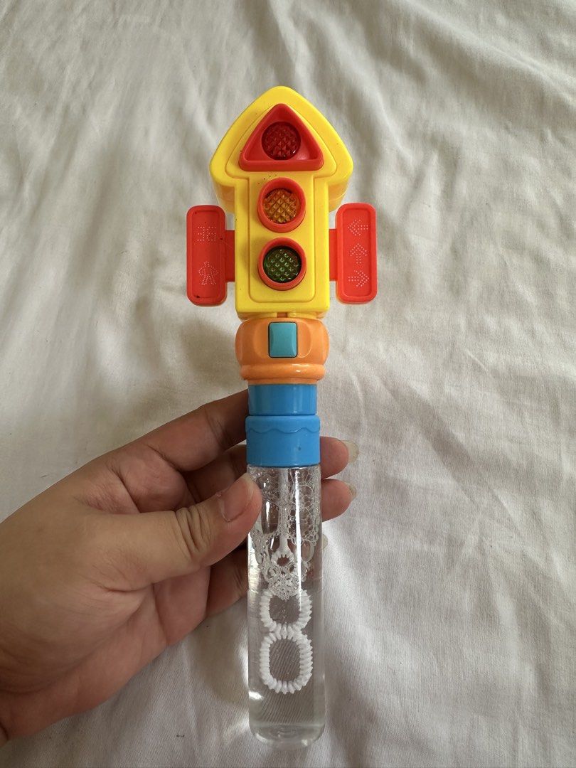 Traffic Light Bubble Wand Toy with Lights (Category: Kids Toys) located in Manila. Submitted by michaellal91842 (Listing ID 1462966703, Image 2). Description: - Fun traffic light design bubble wand - Lights up with a button press - Bubble solution included, ready to use - Easy to play, just blow! - Ideal for outdoor activities and parties - A hit with kids! Perfect for lootbag filler With lights Mall quality/ bought sale sa mall 80 nalang Popping