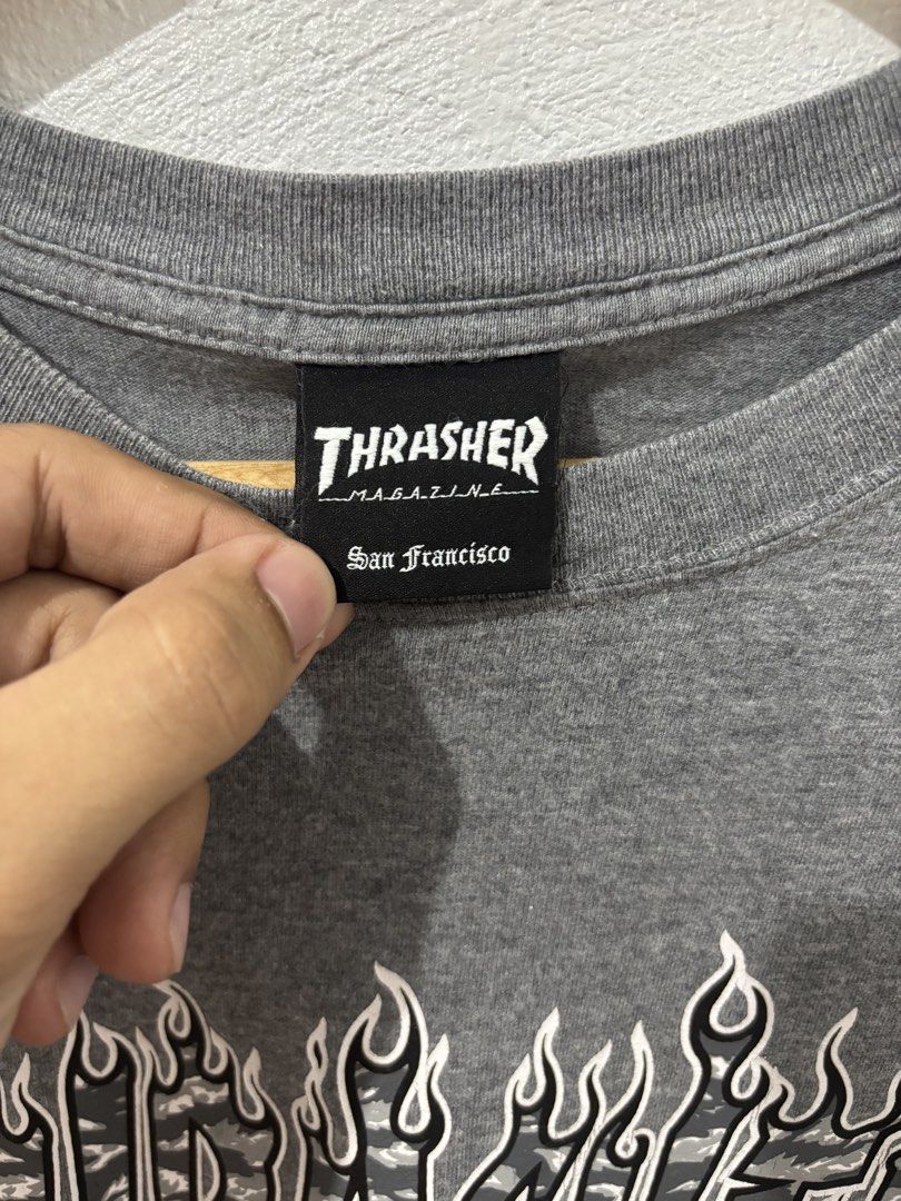 Trasher Shirt (Category: Tshirts & Polo Shirts ) located in Lubao. Submitted by ownly.632 (Listing ID 1463031600, Image 3). Description: MEDIUM SIZE L 26 W 18.5 -complete tags -No hidden Issue - prints very minimal cracks sign of use.