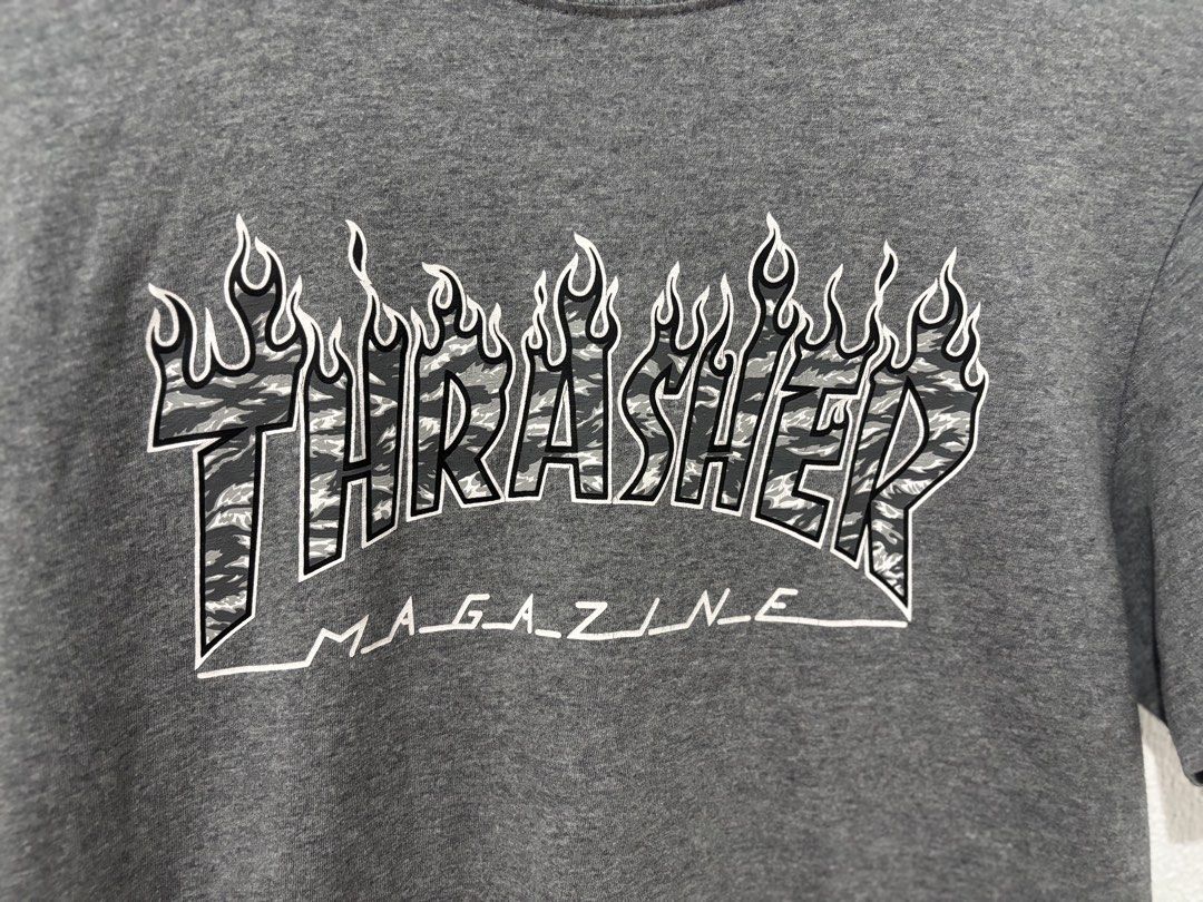 Trasher Shirt (Category: Tshirts & Polo Shirts ) located in Lubao. Submitted by ownly.632 (Listing ID 1463031600, Image 2). Description: MEDIUM SIZE L 26 W 18.5 -complete tags -No hidden Issue - prints very minimal cracks sign of use.