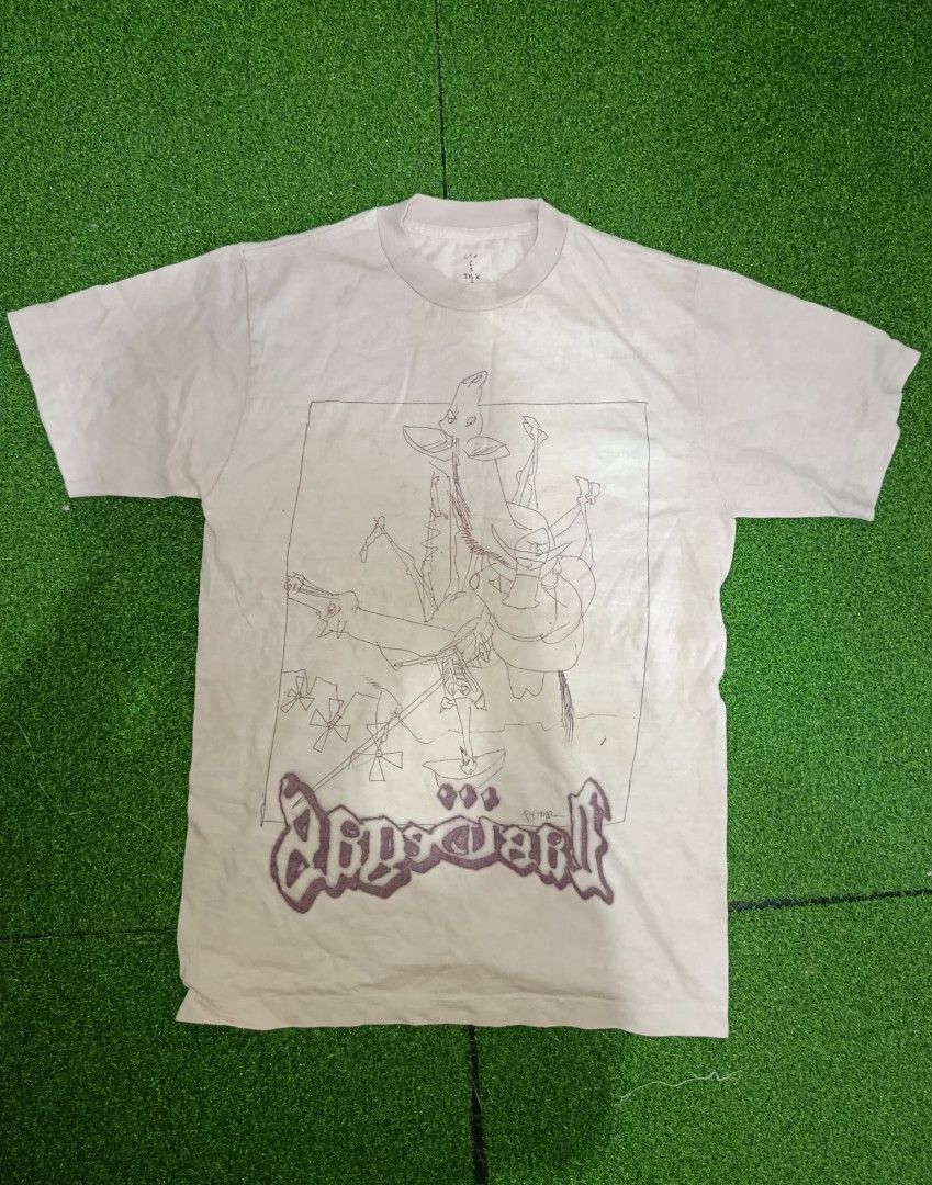 Travis Scott x Ralph Steadman Sketch Tee (Category: Tshirts & Polo Shirts ) located in Valenzuela. Submitted by d.repolthrift (Listing ID 1463000072, Image 1). Description: - White Travis Scott Cactus Jack T-shirt - Features the 'Apparition' graphic print on the front - Made by Travis Scott, 2024 Laflame Enterprises - 100% Cotton - Size S -Width:17.5 -Length:26.5 - Minor stains on the front graphic area (please check photos for details) -Fresh fr