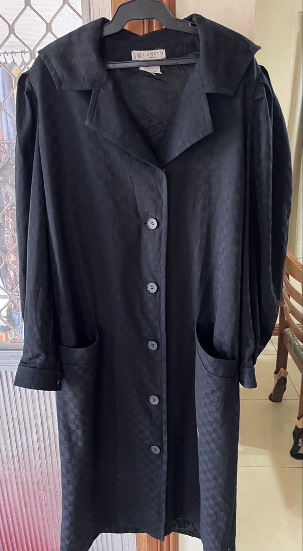 Trench coat (Category: Coats, Jackets and Outerwear) located in Bacoor. Submitted by ayit. (Listing ID 1462928119, Image 1). Description: Negotiable sf inc Med-large fit orig personal japan gling sf inc nego - Brand: Lanvin Paris - Type: Trench Coat - Color: Black - Size: M (EU 38/UK 10/US 6) - Material: 82% Wool, 18% Polyamide - Design: Classic trench style with subtle checkered pattern - Features: Button-up front, two front pockets - Care: Dry 