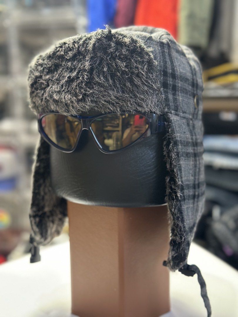 Trouble Incorporated Plaid Trapper Hat - 22 Inch Circumference (Category: Caps & Hats) located in Daet. Submitted by thrifthings2018 (Listing ID 1462994988, Image 2). Description: - Brand: Trouble Incorporated - Style: Plaid Trapper Hat - Size: 22-inch circumference - Features: Faux fur trimmed ear flaps with buckle strap - Benefit: Keeps you warm - Price: P400.