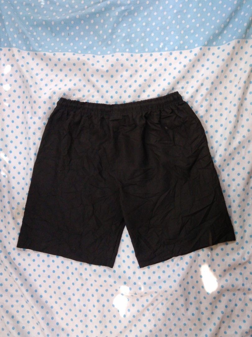 TRYEX Black Shorts with Rainbow Drawstring>dimension 32-36/Length 18 (Category: Shorts) located in San Isidro, Davao Oriental. Submitted by nelthrift30 (Listing ID 1462952824, Image 2). Description: - Brand: TRYEX - Color: Black - Features: Elastic waistband, colorful rainbow drawstring - Detail: Small embroidered logo on lower right leg - Use: Comfortable for lounging or light activity - Condition: Please check photos for details.