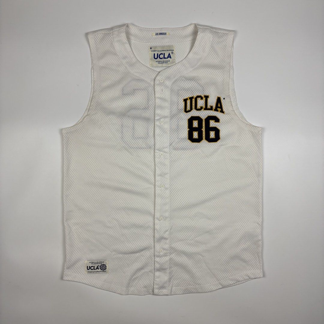 UCLA Botton Down Jersey (Category: Activewear) located in Quezon City. Submitted by 1106_collective (Listing ID 1462946298, Image 1). Description: Size:Meduim Condition:9.5/10 Material: 100% Polyester Made in: China Flaw / Defect: None Dimension Width: 22” Length: 29.5” Shoulder: 15.5”.
