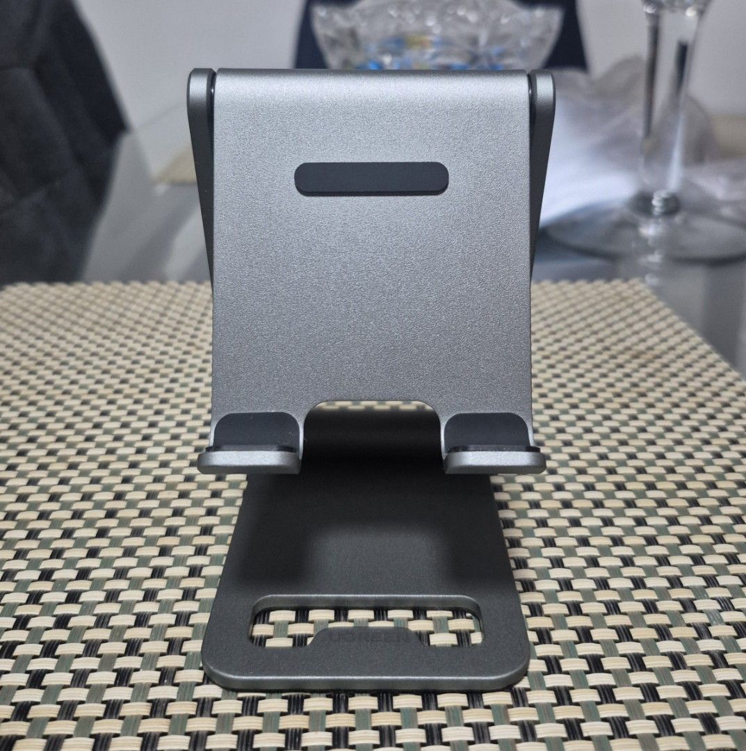 Ugreen Aluminum Foldable Desk Phone Stand (Category: Mounts & Holders) located in San Fernando. Submitted by jianmnss (Listing ID 1462901031, Image 2). Description: Ugreen Aluminum Foldable Desk Phone Stand *Brand new never been used *Box open for checking purposes only *Aluminum, foldable design, rubber buttom for maximum grip *Mode of payment cash, g-cash, and online bank *Available for delivery via LBC, J&T, or Lalamove *Location San Fernando,