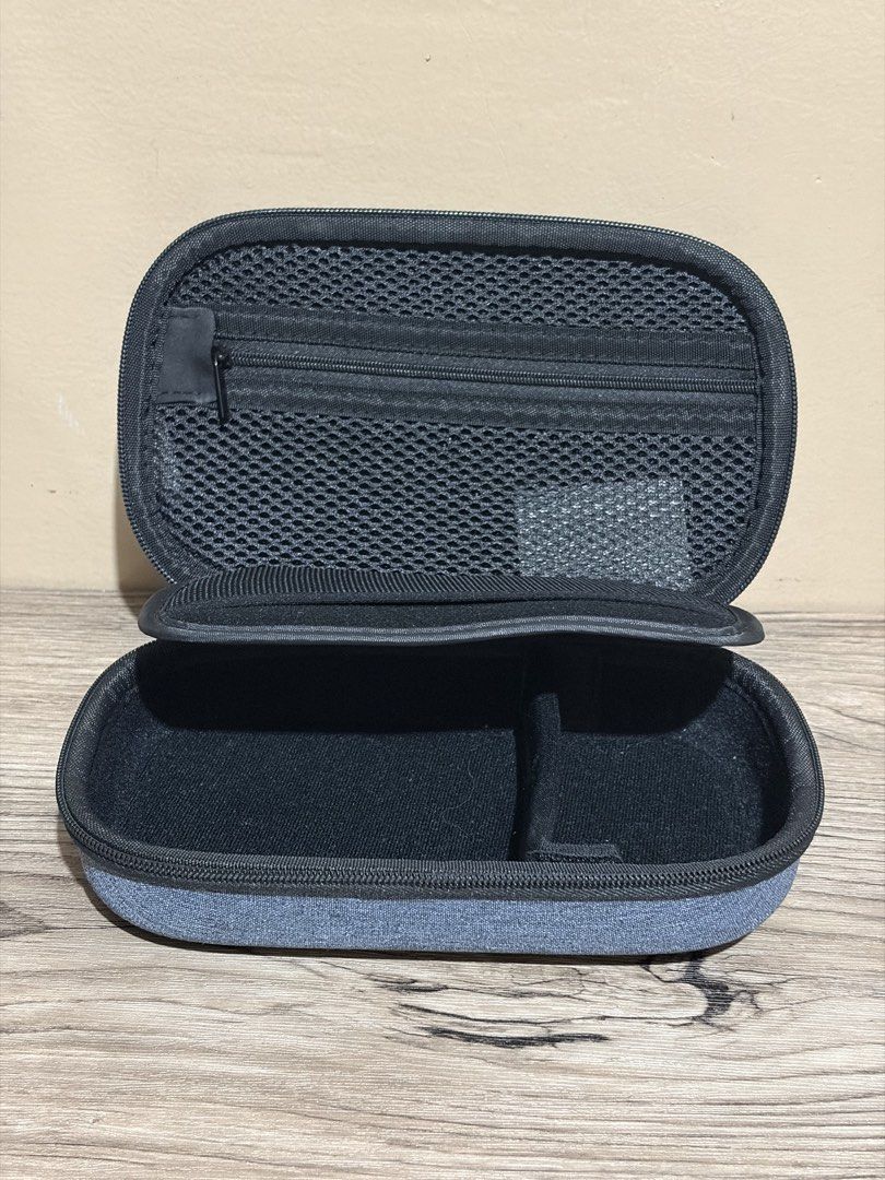 UGREEN Multi-function Storage Case - Grey (Category: Cases & Sleeves) located in Pasig City. Submitted by bitsoutdoor (Listing ID 1462941307, Image 3). Description: - UGREEN Storage Case - Stylish Grey Fabric Exterior - Secure Zipper Closure - Interior Mesh Pocket for organization - Elastic Strap to keep items in place - Ideal for Cables, Chargers, and Small Electronics - Compact and Perfect for Travel - Smoothly working zippers - Like new. .