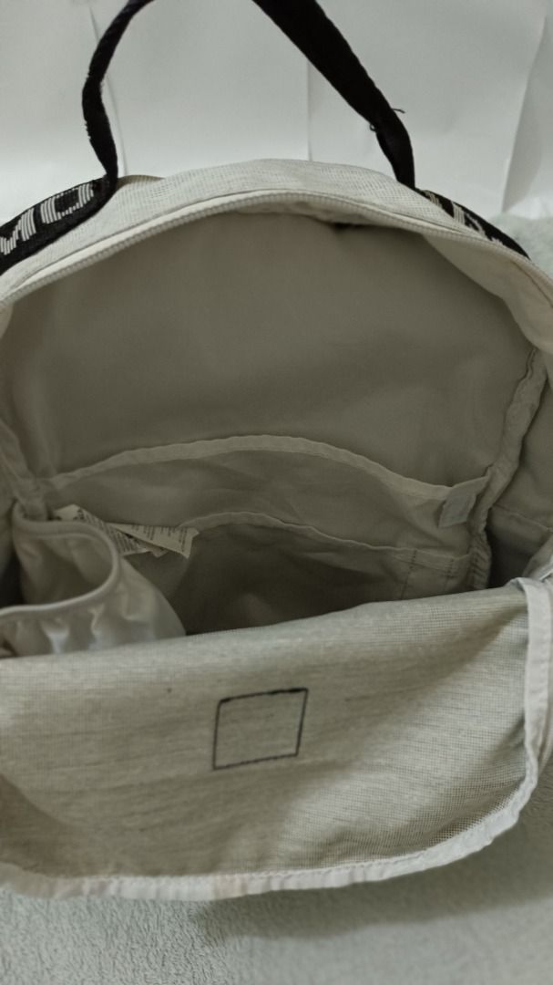 Under Armour Loudon Mini Backpack (Gray, 10L) (Category: Backpacks) located in Baguio. Submitted by onlymelope20980 (Listing ID 1463043405, Image 1). Description: - Brand: Under Armour - Color: White mesh top with black bottom - Features: Adjustable straps with Under Armour branding, main compartment with internal pockets - Ideal for: Everyday use, gym.
