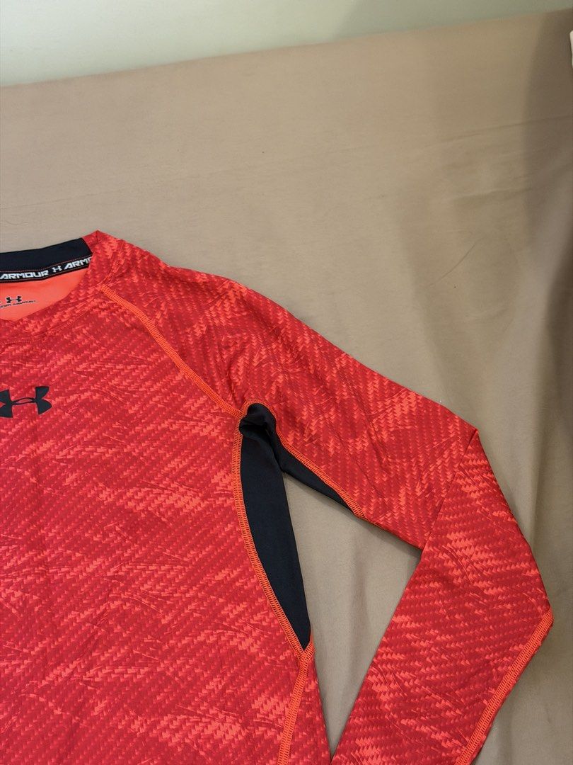 Under Armour Red Patterned Long Sleeve Compression Shirt SM (Category: Activewear) located in Bulacan. Submitted by preloved_bygrace (Listing ID 1462983250, Image 2). Description: - Brand: Under Armour - Color: Red with cool pattern - Accents: Black on sides and collar - Size: SM - Features: Signature performance fabric, UA logo on chest and sleeve Note: Color may vary due to lighting. RFS: decluttering, need funds *Buyer shoulders the SF (J&T or