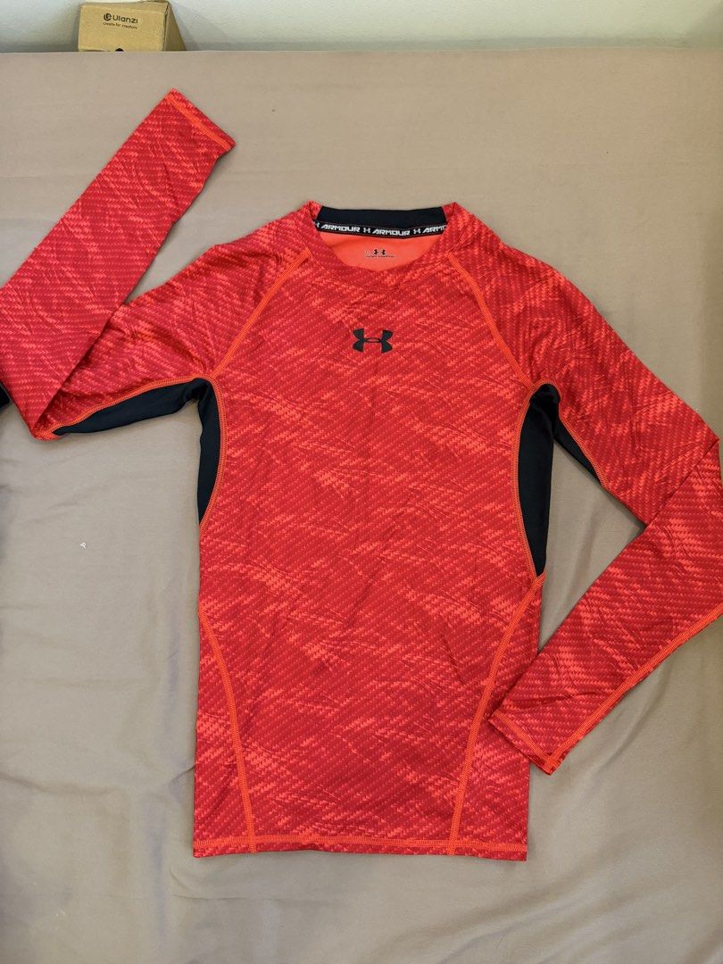 Under Armour Red Patterned Long Sleeve Compression Shirt SM (Category: Activewear) located in Bulacan. Submitted by preloved_bygrace (Listing ID 1462983250, Image 1). Description: - Brand: Under Armour - Color: Red with cool pattern - Accents: Black on sides and collar - Size: SM - Features: Signature performance fabric, UA logo on chest and sleeve Note: Color may vary due to lighting. RFS: decluttering, need funds *Buyer shoulders the SF (J&T or