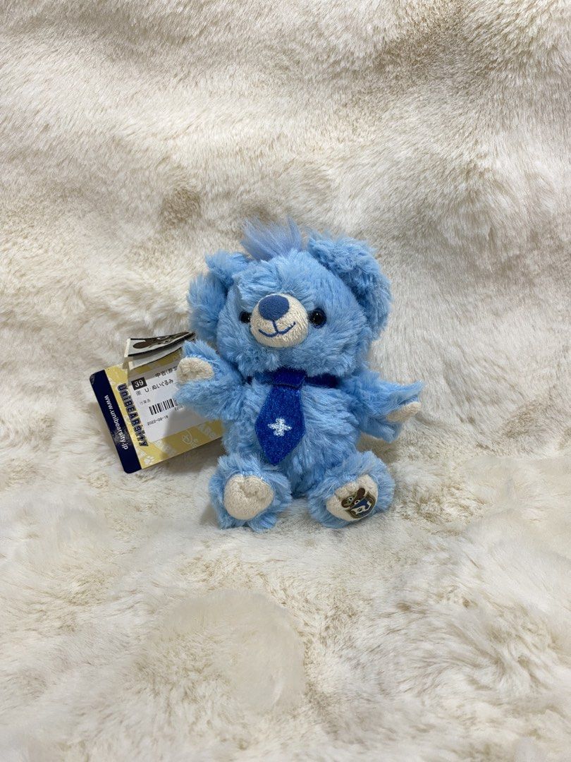 UniBEARsity “Stitch” Plush charm keychain (Category: Plushies & Soft Toys) located in Kalibo. Submitted by ollie_stuffshop (Listing ID 1462901195, Image 1). Description: Before you send your inquiries: ❗️Last Price is already posted ❗️Manage your expectations, WYSIWYG ❗️May need washing ❗️Dropoff is every Wednesday & Sunday - Adorable blue bear plush toy - Features a cute little tie - Comes with a convenient chain for attaching - Perfect for clip