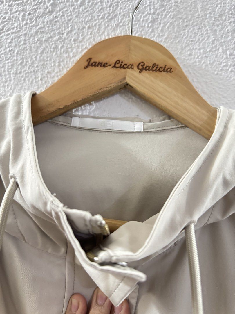 Uniqlo Beige Hooded Jacket with Drawstring (Category: Coats, Jackets and Outerwear) located in Manila. Submitted by janelica220598 (Listing ID 1462896729, Image 3). Description: USED ONCE ONLY BOUGHT FOR 2999 - Lightweight beige jacket - Features a hood with drawstring - Button-up front closure - Two front pockets - Drawstring at the hem - Ideal for casual outings and layering.